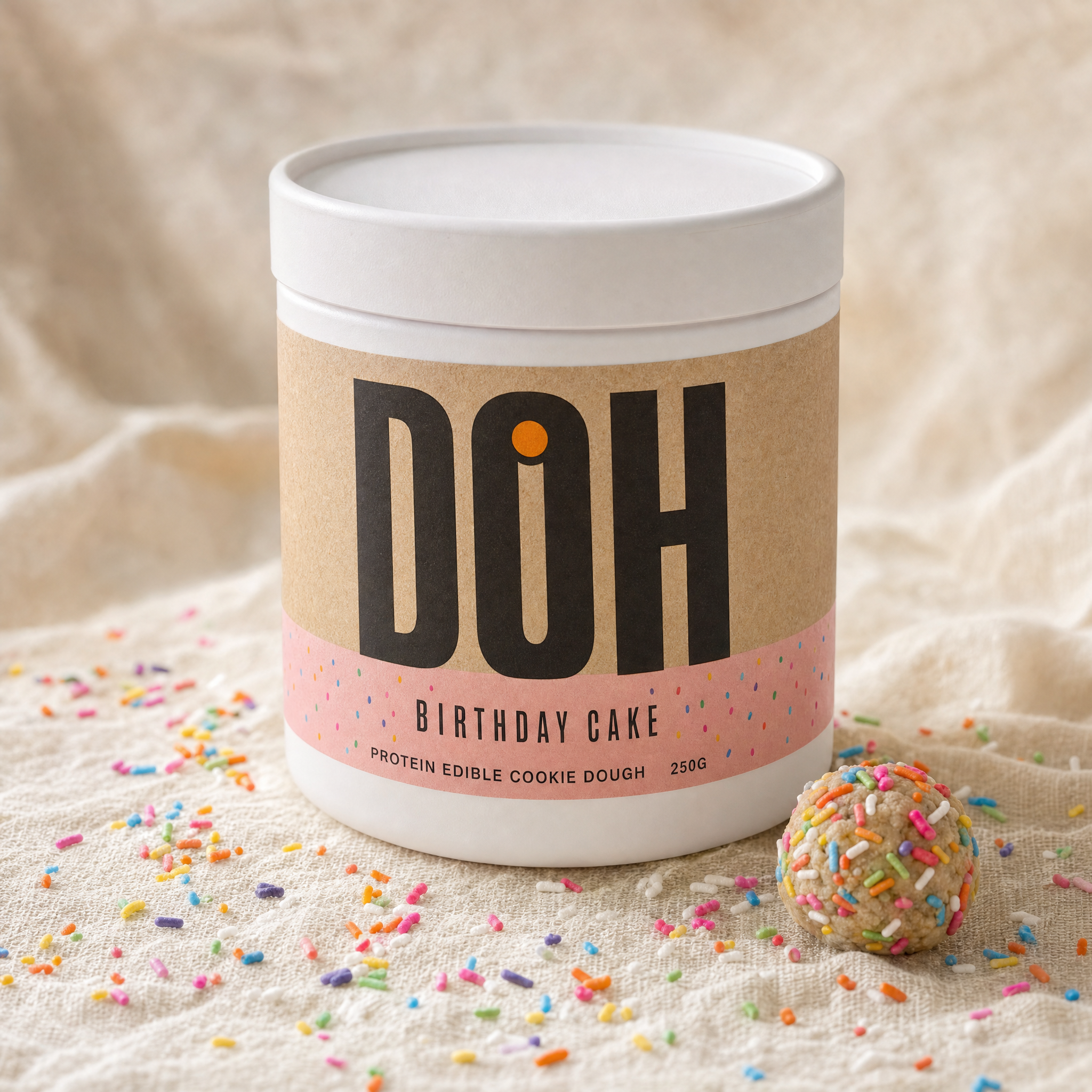 DOH Snacking Dough — Birthday Cake tub with pastel pink confetti band and rainbow sprinkles