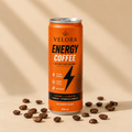 Velora Energy Coffee 250ml RTD can hero on warm beige