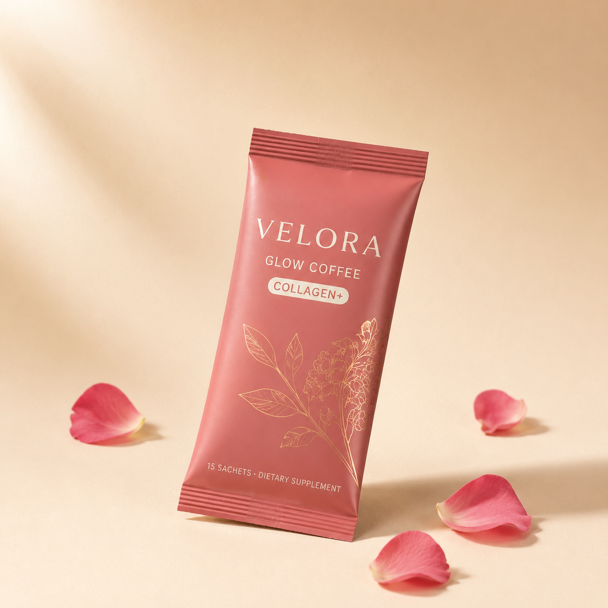 Velora Glow Coffee sachet hero shot on cream backdrop with rose petals